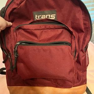 Trans maroon leather bottom backpack, great condition.